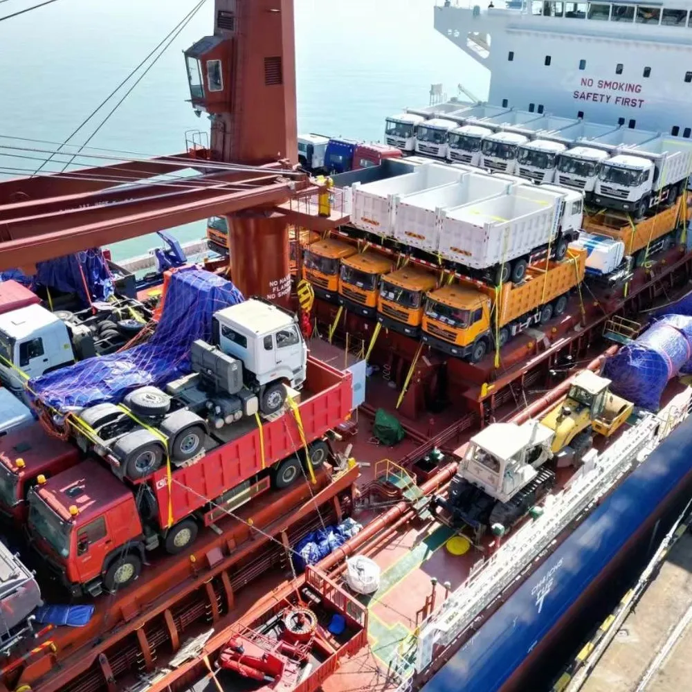 Trucks lashed down on the vessel deck at the port, ready for the voyage